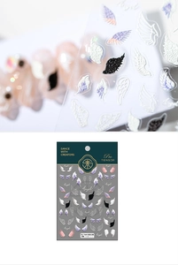 Detail of 5D embossed angel wing nail stickers showing 3D texture and diverse feather patterns