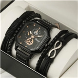 Close-up of men's watch and leather bracelet set in a black gift box packaging