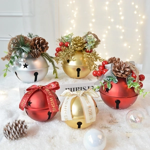 Christmas tree bell ornaments with pine cones and ribbons in red, gold and silver