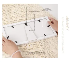 Detailed back view of wood triple baby ultrasound frame with stand and wall hooks