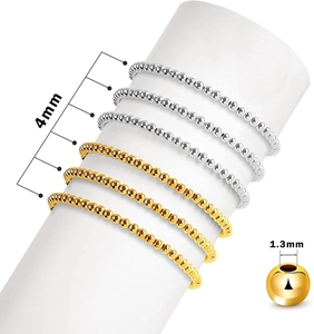 Detailed view of 4mm silver and gold round beads on bracelets for jewelry making