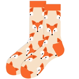 Close-up of beige crew socks featuring cute orange fox patterns and contrast toe design