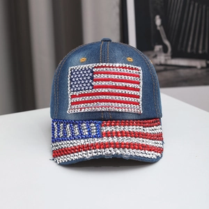 Detail of denim baseball cap with rhinestone American flag pattern and metal studs