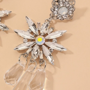 Elegant silver flower drop earrings with sparkling crystals and water-drop tassels