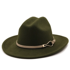 Detail of dark green flat brim fedora hat with beige leather band and gold buckle