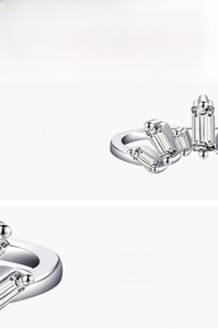 Dettaglio macro di un anello a corona in argento 925 con pietre di zirconia 5A incastonate