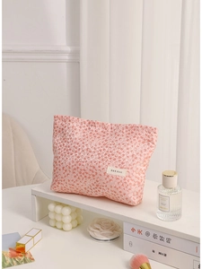 Pink leopard print large capacity makeup bag with H&R BAG label on a shelf