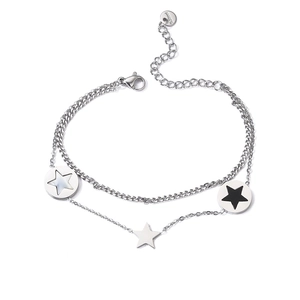 Double-layered stainless steel star bracelet with silver and black charms on white background