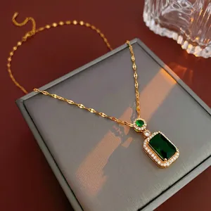 French retro emerald square necklace with gold chain and sparkling crystal halo pendant