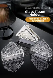Detail of crystal glass napkin holders with embossed patterns on marble table