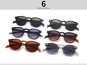 Close-up of retro round sunglasses available in six stylish colors with high-quality frames