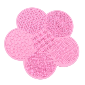 Pink floral silicone makeup brush cleaning mat with multiple textures for deep washing