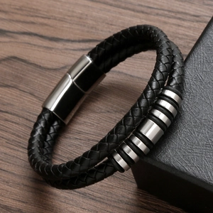 Men's minimalist black braided leather bracelet with silver stainless steel clasp and accents