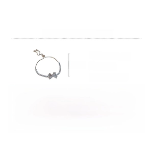 Detailed view of cubic zirconia bow bracelet with copper base measurements 24.8cm by 1.3cm