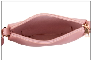 Pink PU leather handbag detail showing smooth zipper and spacious inner compartment