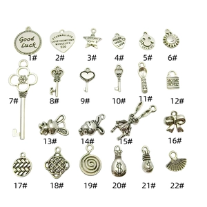 Lot de 22 breloques argentées avec clés cœurs et animaux pour la création de bijoux DIY