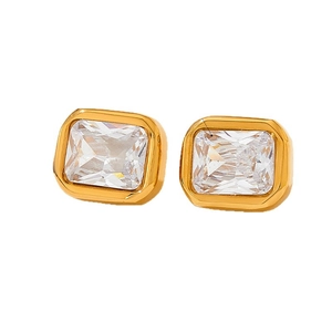 Square emerald cut zircon earrings in gold plated stainless steel on white background