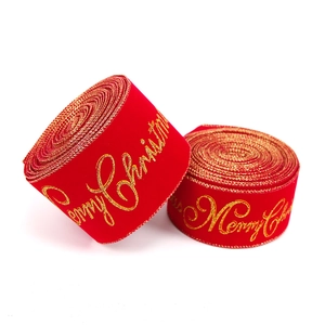 Red velvet Christmas ribbon with gold Merry Christmas lettering and wired edges