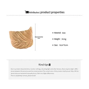 Detailed size view of gold leaf textured open cuff bracelet made of iron, 6cm x 6cm