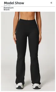 Detail shot of black high-waisted flare yoga pants with matte elastic fabric and slim fit