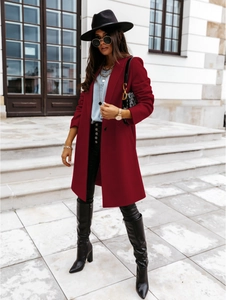 Fashionable long wine red wool coat for women styled in a European street setting