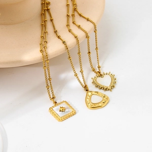 Gold plated stainless steel necklace set with white shell heart and square pendants