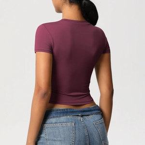 Rear view of a slim fit burgundy workout t-shirt in quick-dry fabric and crew neck