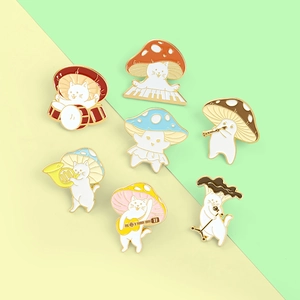 Detail of 7-piece enamel brooch set featuring mushroom cats playing musical instruments