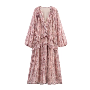 Pink paisley print long sleeve dress with V-neck and layered ruffles on white background