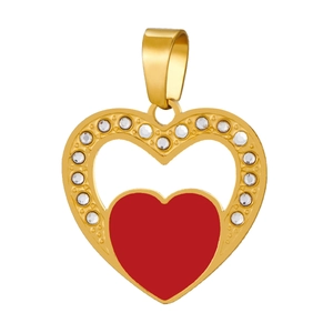Macro detail of gold heart pendant with sparkling crystals and red heart centerpiece