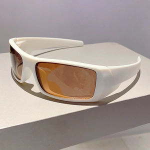 Detail view of wrap-around cycling sunglasses with white frames and orange lenses