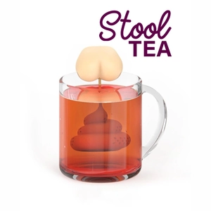 Detailed view of novelty silicone butt and poop shaped tea infuser in a glass cup
