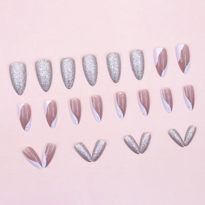 Long almond silver glitter nails with elegant white and pink wave pattern finish