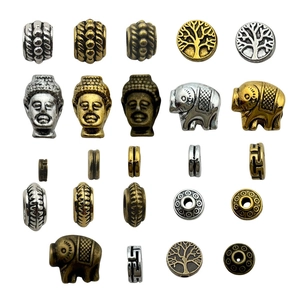 Assorted DIY alloy spacers in elephant and tree designs, silver and gold finish