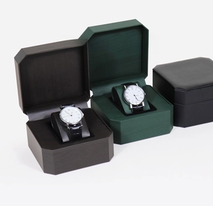Three octagonal PU leather watch boxes in black, brown, and green with velvet pillows