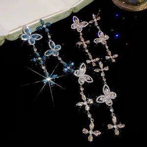 Silver needle butterfly tassel drop earrings with sparkling rhinestones in blue and white