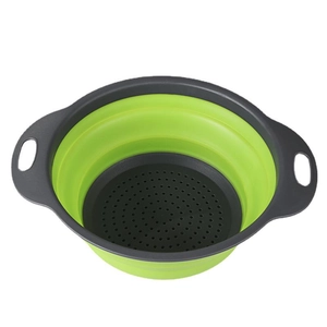 Collapsible green silicone colander with ergonomic grey handles for kitchen food straining