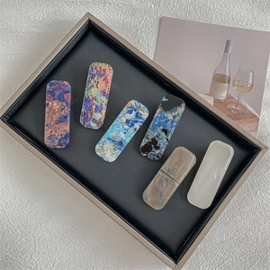 Set of vintage textured rectangular hair clips in marble and oil painting patterns