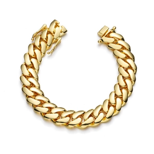 Polished gold Cuban link chain bracelet with a heavy-duty box clasp on white background