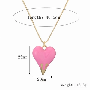 Detailed view of pink enamel heart necklace with dimensions and weight specs