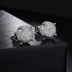 Macro shot of silver hip hop stud earrings with micro-pave white cubic zirconia