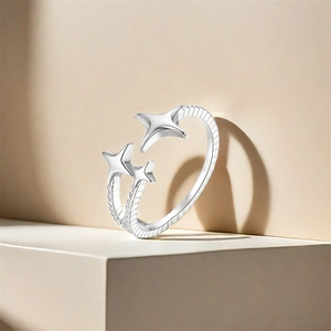 Macro shot of S925 sterling silver open ring with star motifs and twisted rope texture