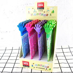Macro shot of 32-piece creative colorful palm-shaped pencils in display packaging box