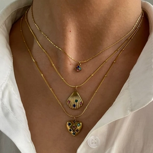 Three-layer gold stainless steel necklace with shell, heart, and gemstone pendants