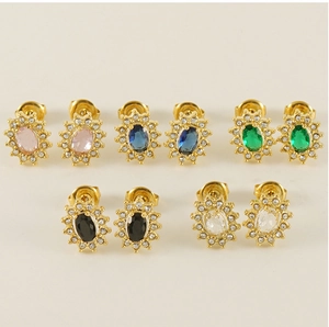 Detail of sunflower zircon earrings in gold-plated steel with colorful oval stones