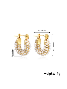 Detail showing 18K gold-plated U-shaped earrings with dense faux pearl embellishments