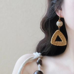 Bohemian woven triangle earrings with wooden beads and cream cotton thread detailing
