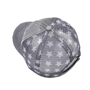 Detail of grey washed baseball cap showing breathable white star mesh and ponytail hole