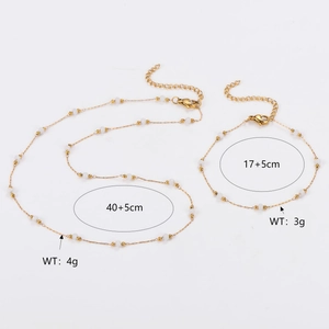Gold beaded necklace and bracelet set featuring minimalist star-themed jewelry design