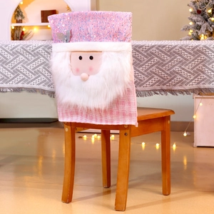 Close-up of pink sequin Santa chair cover with plush beard and plaid details